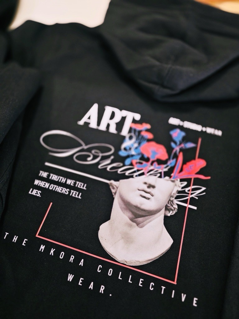 Close-up of the Art and Wear hoodie graphic