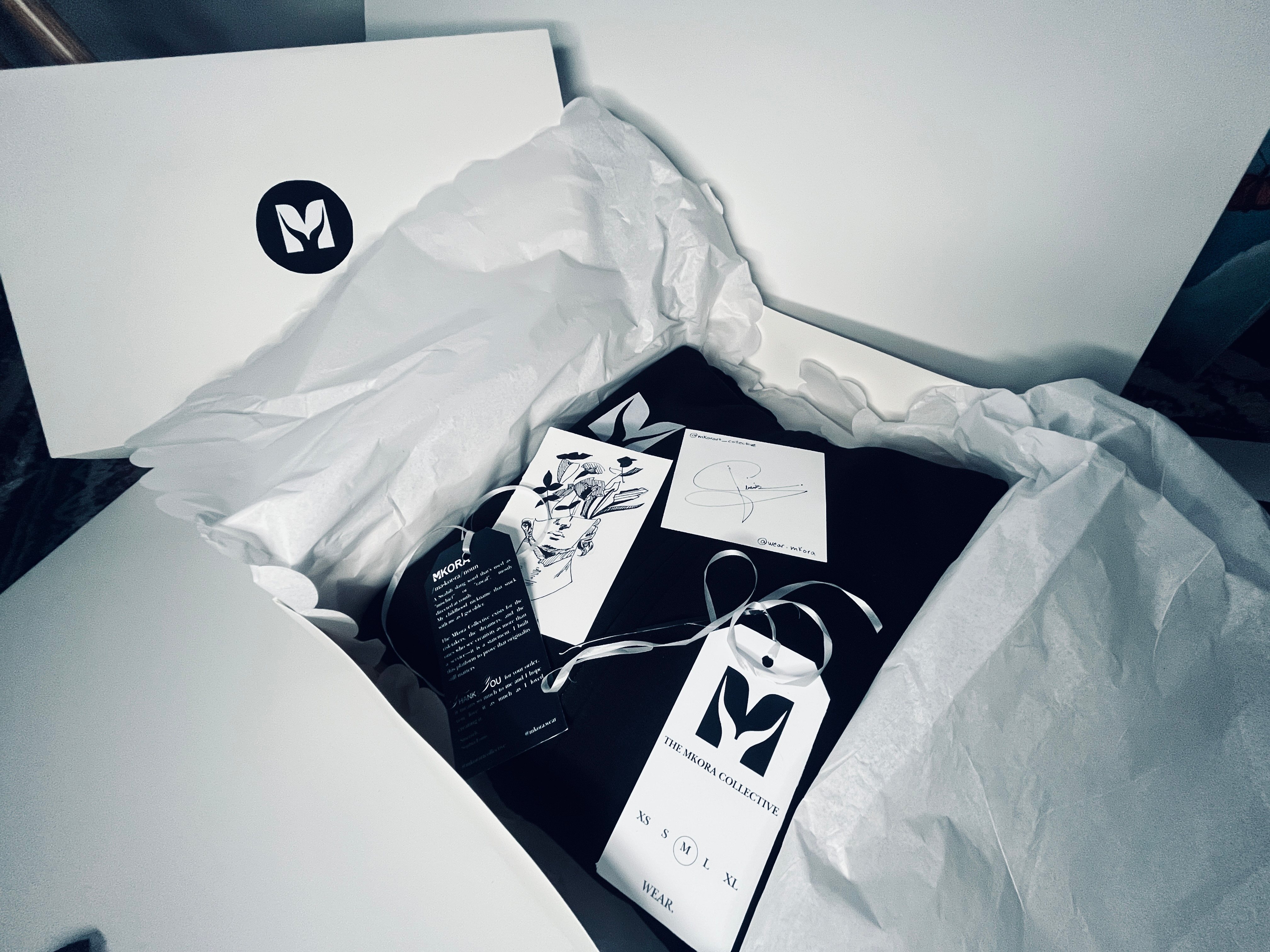 Mkora apparel packaging and printed materials